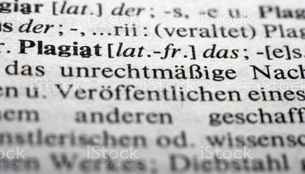 Germany,Extreme close up of english dictionary page with word plagiat